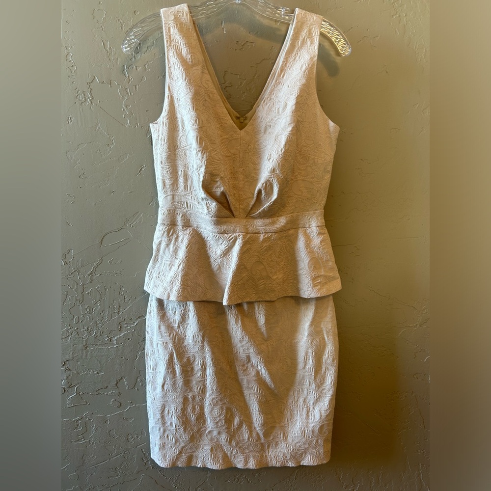 Classy light pink peplum dress
